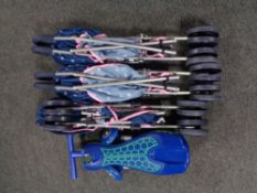 A box of three folding Mamas & Papas doll's push chairs,