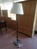 A standard lamp and shade