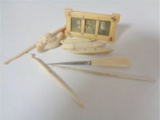 A carved meerchaum pipe together with antique ivory tools etc.