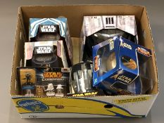 A collection of boxed Star Wars figures including boxed Star Wars die cast Titanium figures,