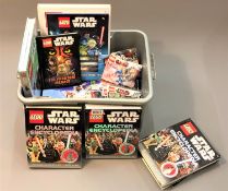 A quantity of Lego Star Wars models and related material including Lego Star Wars character