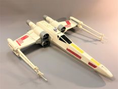 Two Star Wars model Millennium Falcons,