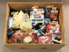 A collection of Star Wars Hot Wheels vehicles, all in original packaging.