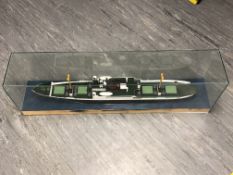 A large model ship behind glass, length 123cm.