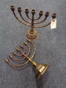 A pair of brass menorah
