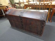 An antique metal bound shipping trunk (locked - no key)