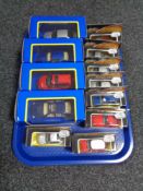 A tray of thirteen boxed Corgi die cast vehicles