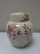 A Moorcroft spring blossom lidded ginger jar, height 16.5 cm.