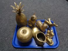 A tray of assorted brass ware, animal figures, boot planter,