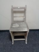 An antique pine library chair