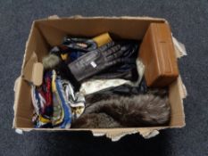 A box of lady's scarfs, leather gloves, furs,