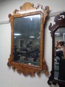 A Victorian mahogany Chippendale style wall mirror.
