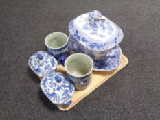 A 19th century blue and white soup tureen on stand,