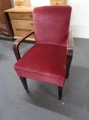 A mid 20th century armchair in pink dralon