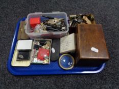 A tray of wooden trinket box, assorted keys, compacts, bottle openers, gent's spectacles,