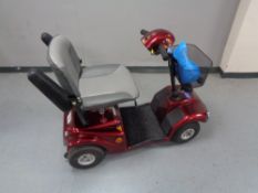 A mobility scooter with key and charger