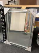 An all glass contemporary mirror,