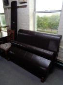 A contemporary brown leather 4'6