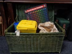 A wicker box of Duplo building blocks,