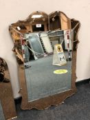 An Art Deco two-tone all glass mirror,