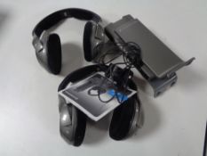 A box of two sets of Sennheiser headphones.