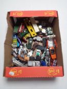 A box of playworn die cast vehicles,