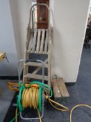 A Hoselock hose pipe on reel with attachment,