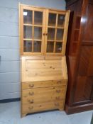 A pine bureau bookcase