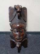 A large carved hardwood tribal mask