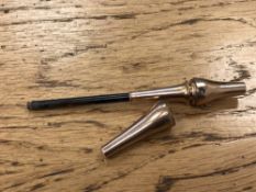 An unusual rolled gold cheroot holder