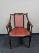 An Edwardian mahogany elbow chair
