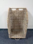 A wicker log trolley