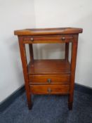A mahogany occasional table fitted with a slide