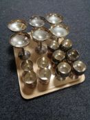 A tray of plated drinking vessels
