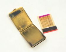 A 9ct gold match holder, the hinged lid engraved 