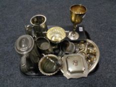 A tray of twentieth century plated wares, part tea service, napkin rings, goblet, cased servers,