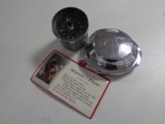 A vintage Jaguar wheel cap, Kienzle car clock and one book - Project cars the art of immersion.