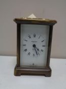 A brass cased carriage clock by Bayard of France