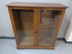 An oak double door bookcase