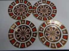 Four Royal Crown Derby Imari side plates, width 21.3 cm.