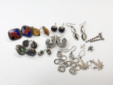Twelve various pairs of silver earrings
