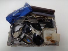 A box of gent's sun glasses, wrist watches,