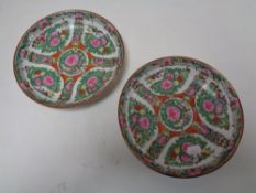 A pair of Chinese famille Rose shallow dishes, width 21 cm.