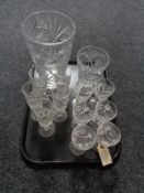 A tray of crystal champagne flutes and wine glasses,