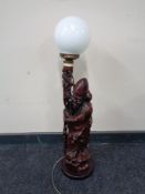 A carved hardwood figural table lamp : Chinese elder,