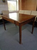 A mid 20th century walnut writing desk