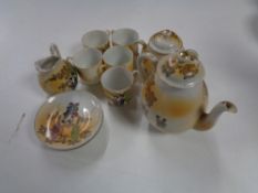 A thirteen piece Japanese eggshell tea service