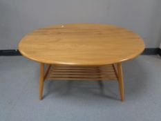 An Ercol elm coffee table with under shelf
