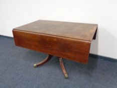 A mahogany drop leaf sofa table