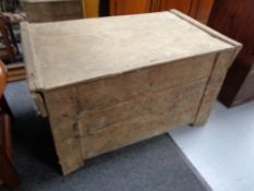 A rustic pine hay bin